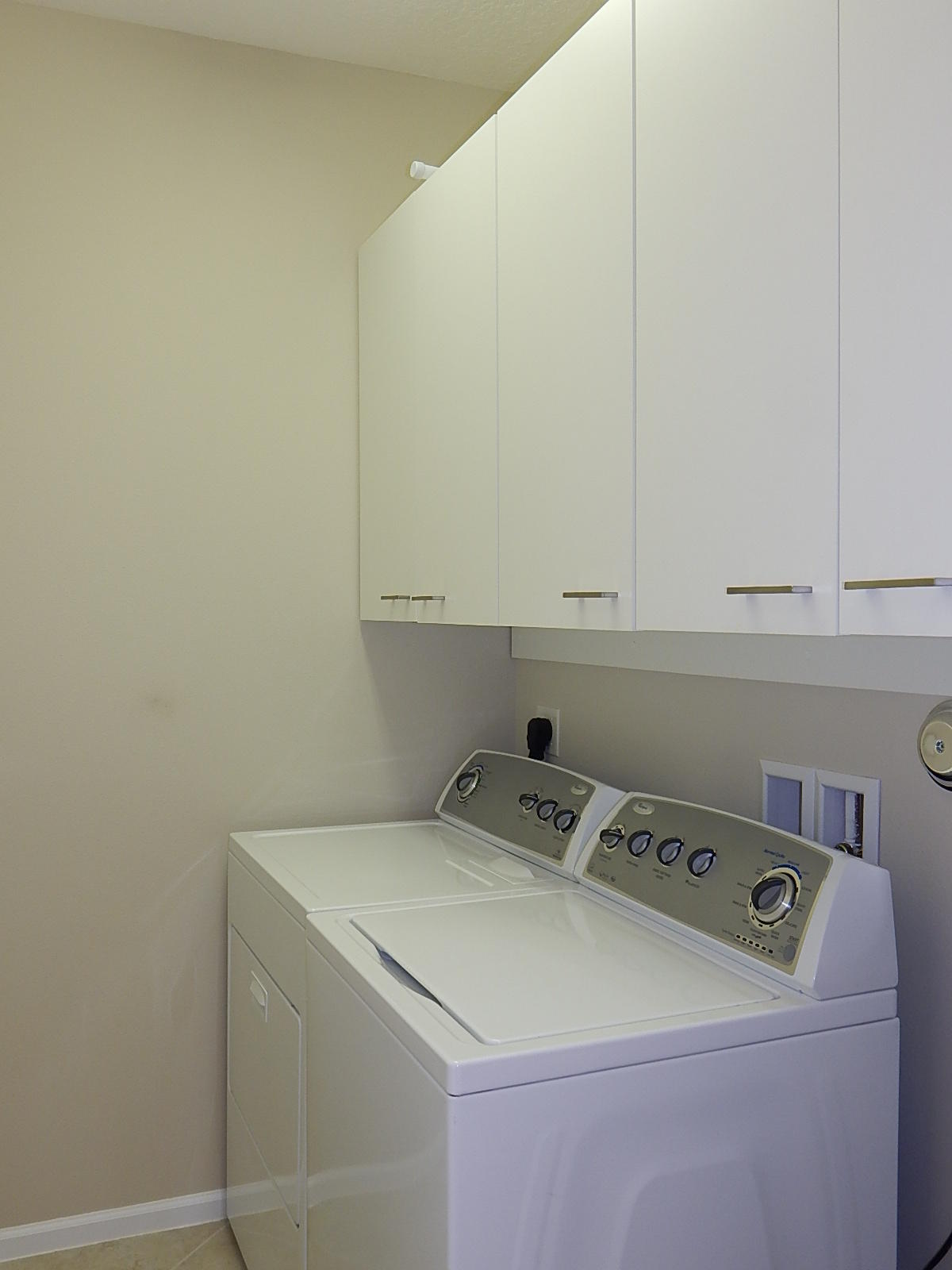 4841 Northwest 16th Terrace Boca Raton, FL 33431 - Photo 29 of 52 4841 Laundry Room with overhead cabinets