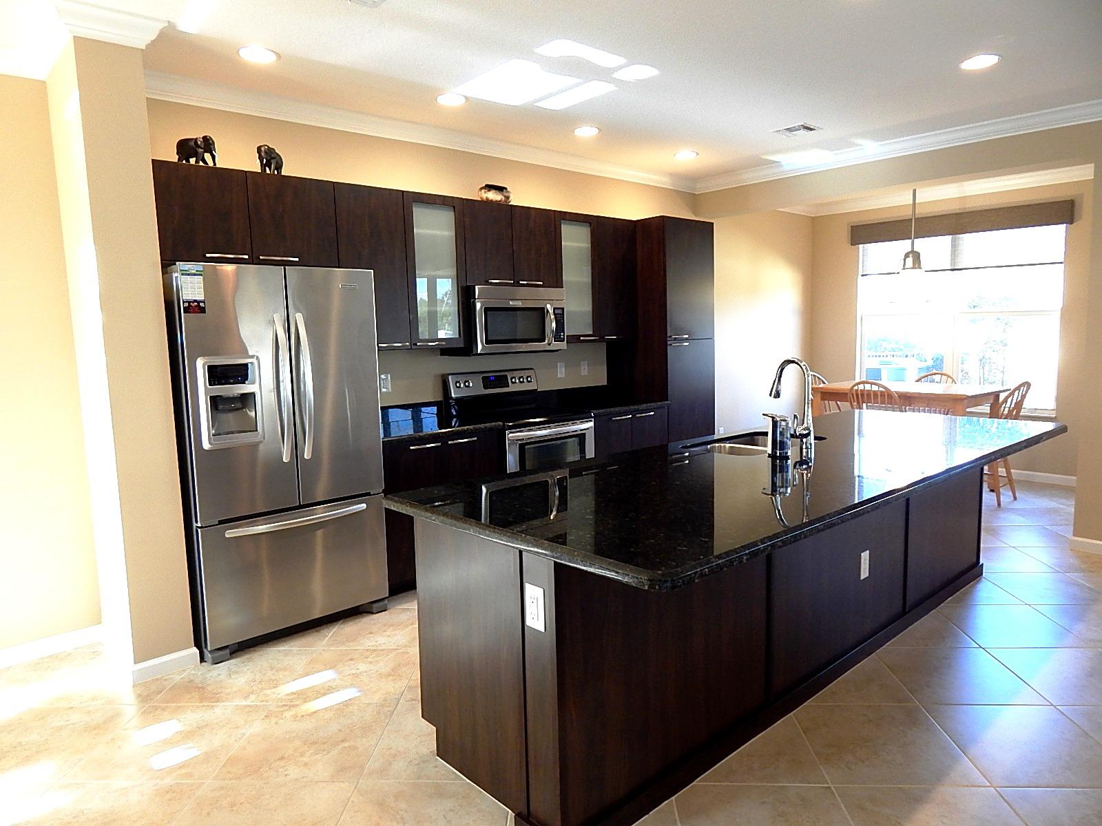 4841 Northwest 16th Terrace Boca Raton, FL 33431 - Photo 3 of 52 4841 kitchen on angle mit brkfast room i