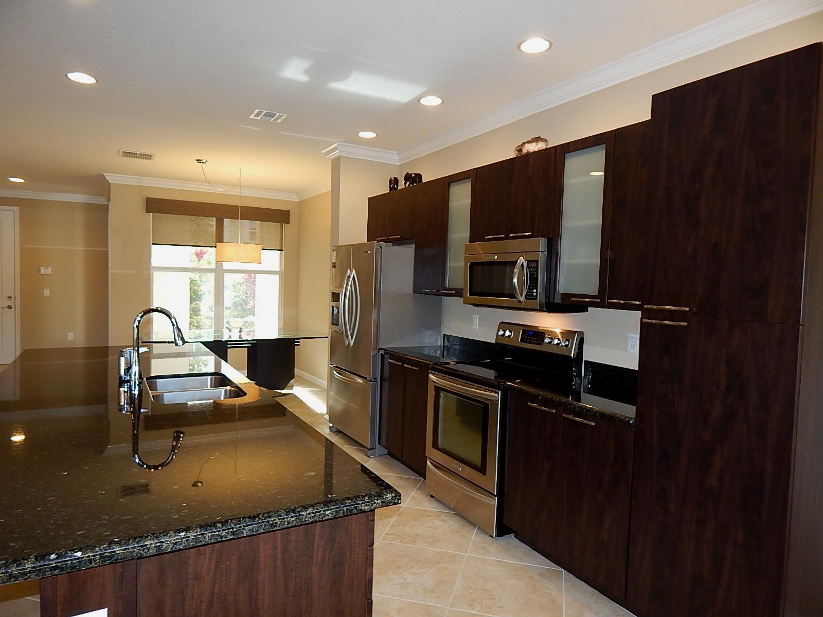 4841 Northwest 16th Terrace Boca Raton, FL 33431 - Photo 9 of 52 4841 Kitchen and dng rm in bkgrd