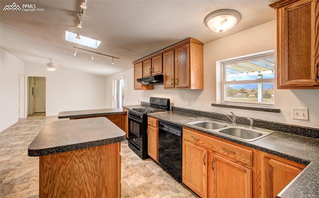 5710 Prospero Road Peyton, CO 80831 - Photo 5 of 34 Spacious Kitchen
