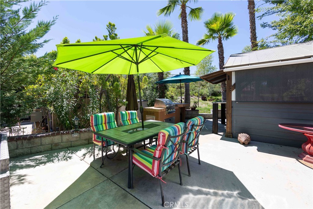 45525 Highway 79 Aguanga, CA 92536 - Photo 6 of 22 a chair and tables in the patio