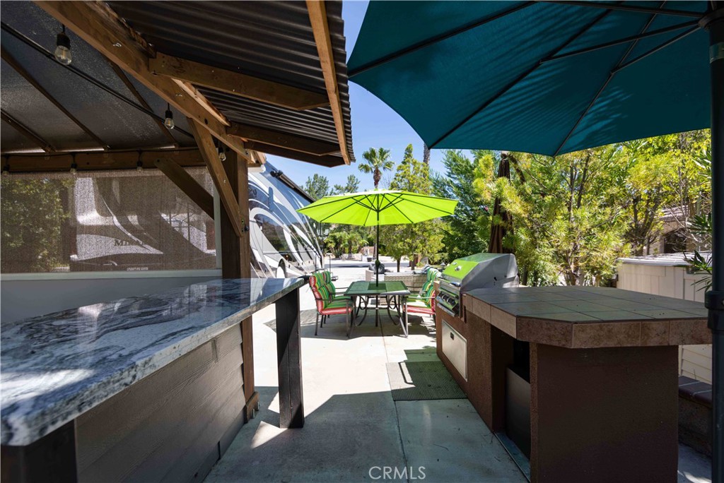 45525 Highway 79 Aguanga, CA 92536 - Photo 10 of 22 a view of a chairs and table in the patio
