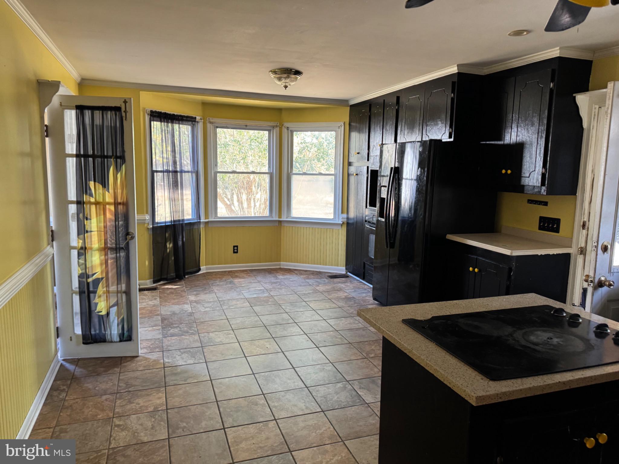 160 Rouzie Drive Tappahannock, VA 22560 - Photo 5 of 10 a kitchen with stainless steel appliances granite countertop a refrigerator a stove and a sink