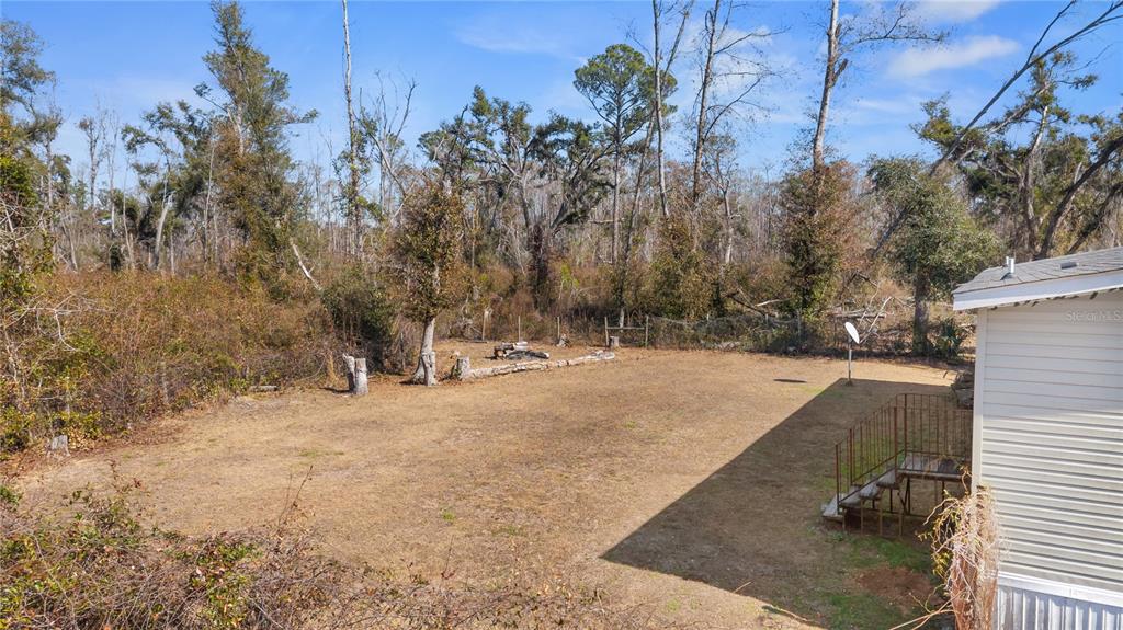 1650 Lyman Hendry Road, Unit 1 Perry, FL 32347 - Photo 20 of 30 a view of outdoor space and yard