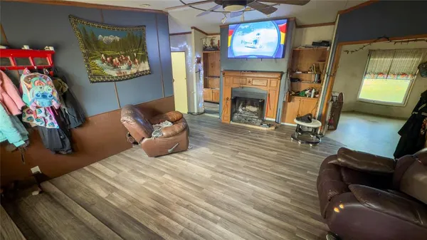 a kitchen with a sink a microwave a stove and refrigerator