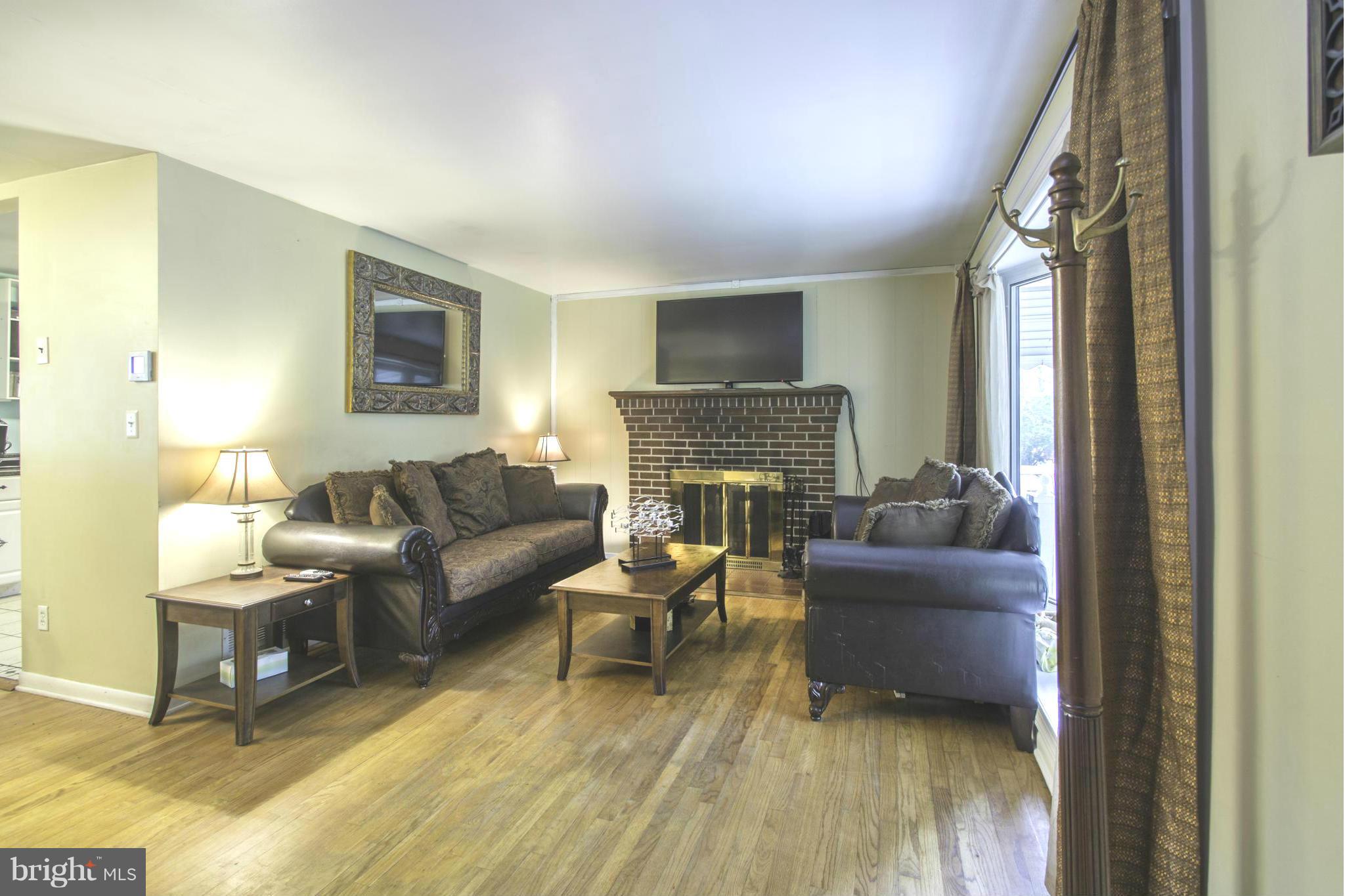 810 Meadow Road Severn, MD 21144 - Photo 3 of 29 Living Room with Fireplace
