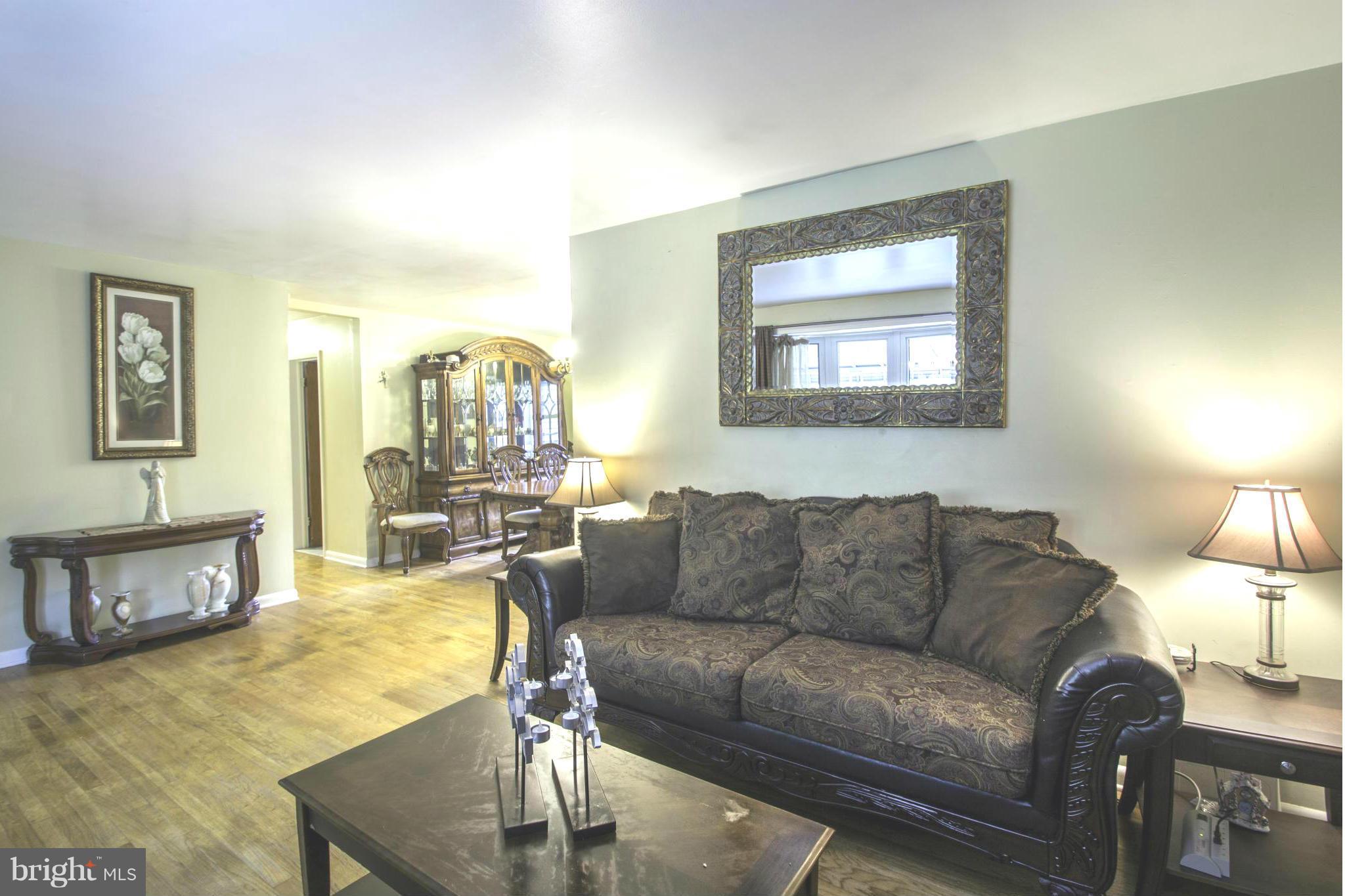 810 Meadow Road Severn, MD 21144 - Photo 7 of 29 Living Room looking into Dining Room