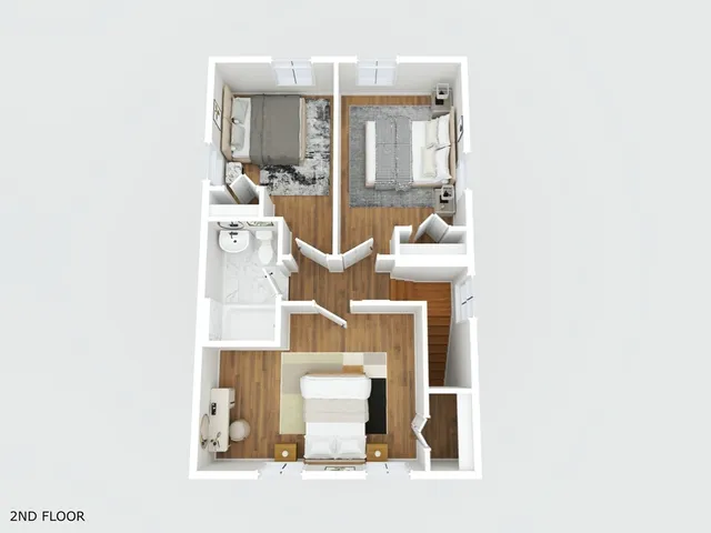 a view of living room with furniture and wooden floor