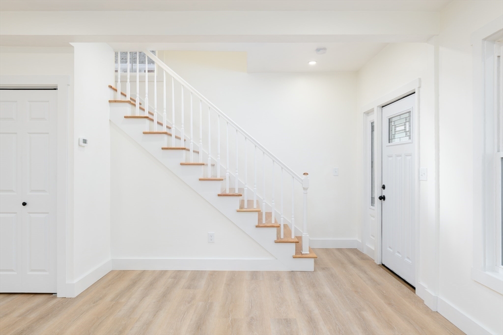 33 Florence Street Worcester, MA 01610 - Photo 6 of 36 a view of entryway with wooden floor