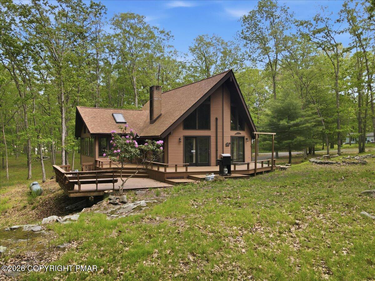 1517 Deer Run East Bushkill, PA 18324 - Photo 4 of 42 a view of a house with pool and sitting area