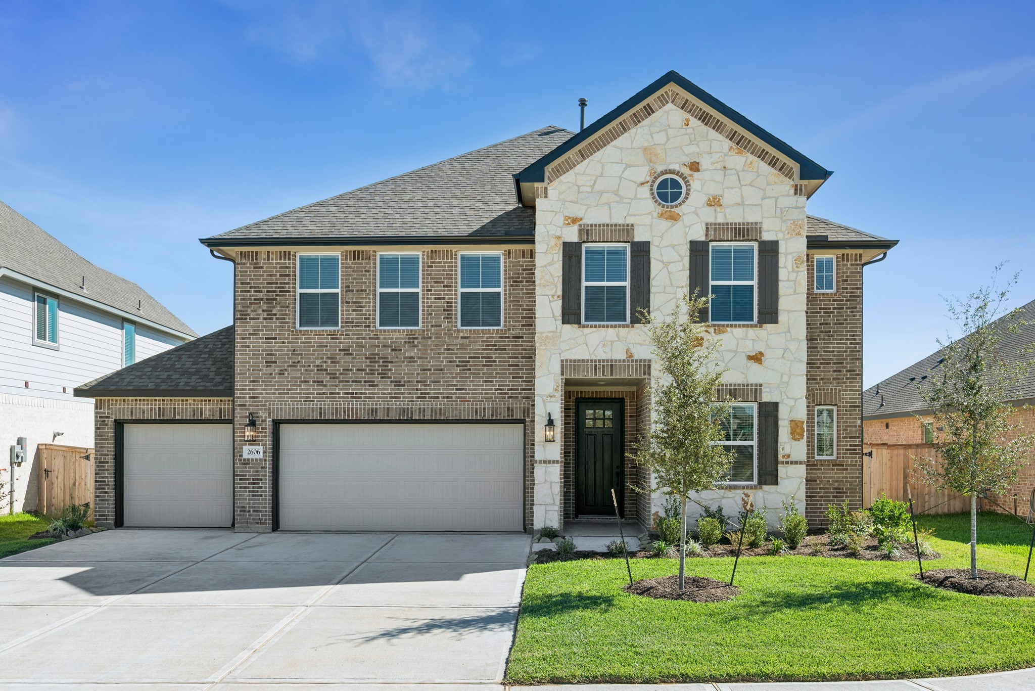 2606 Wastelbread Lane Rosenberg, TX 77471 - Photo 1 of 46 a front view of a house with a yard and garage