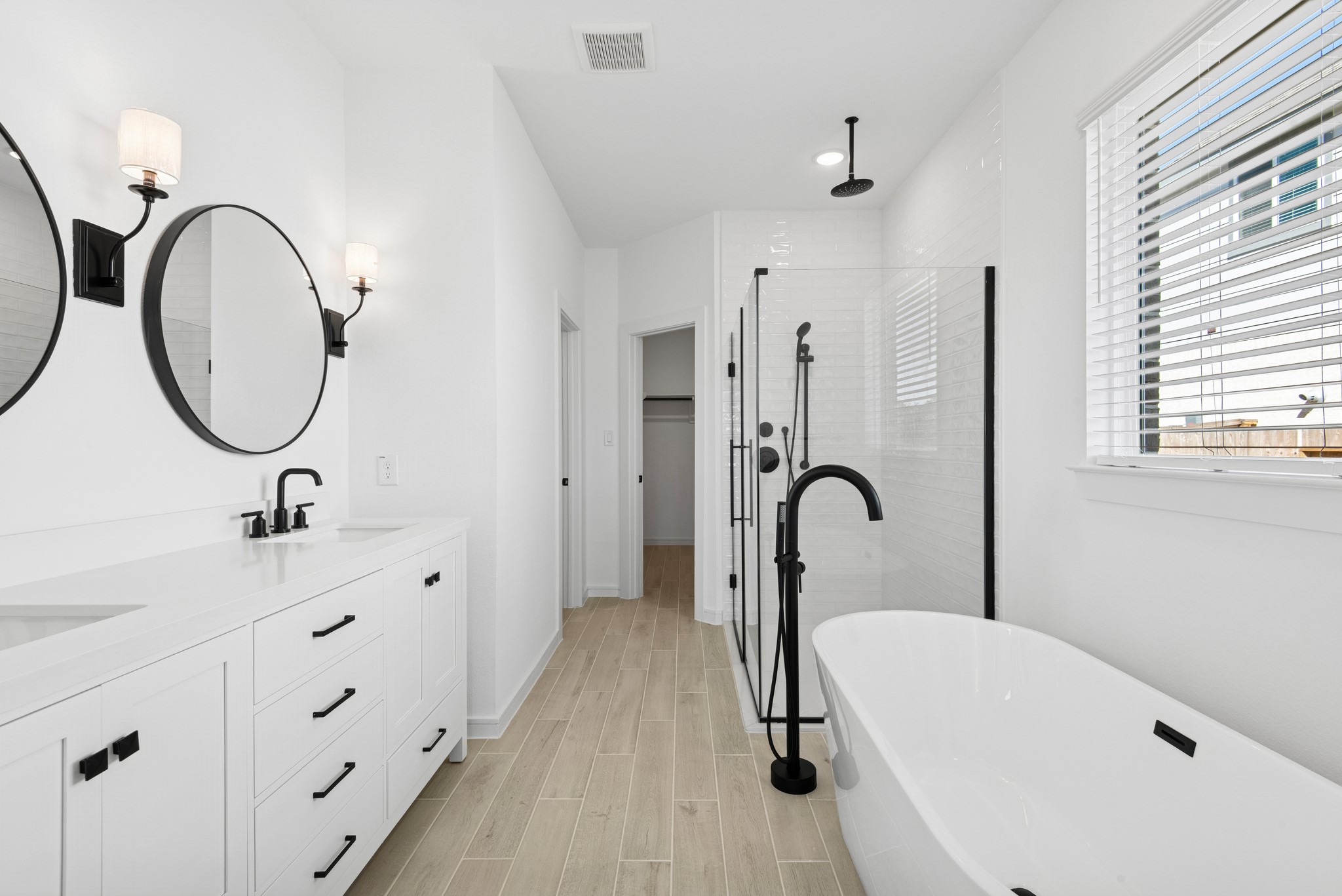 2606 Wastelbread Lane Rosenberg, TX 77471 - Photo 13 of 46 a bathroom with a sink a toilet and a mirror