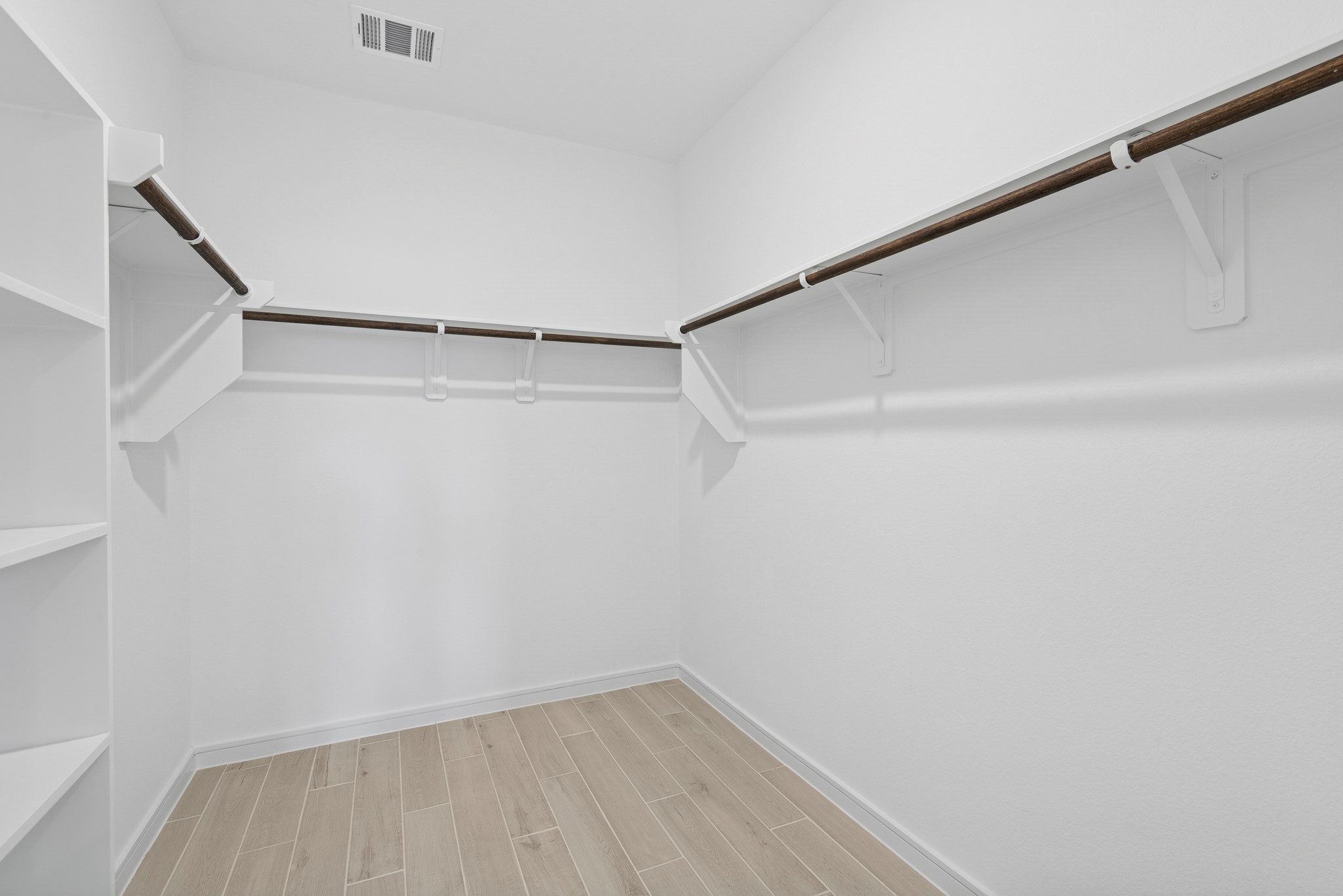 2606 Wastelbread Lane Rosenberg, TX 77471 - Photo 14 of 46 a view of small space with racks on the wall