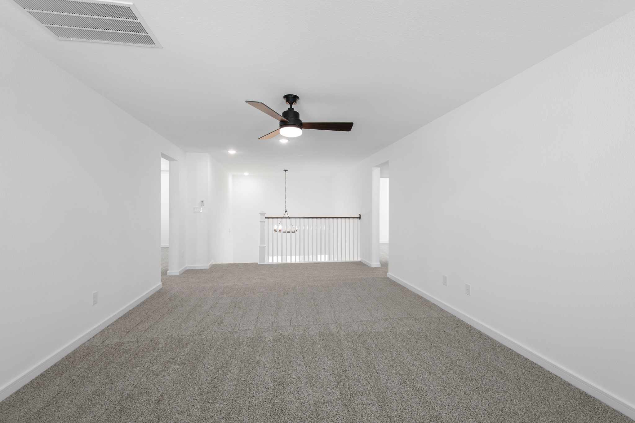 2606 Wastelbread Lane Rosenberg, TX 77471 - Photo 15 of 46 a view of a livingroom with a ceiling fan and window