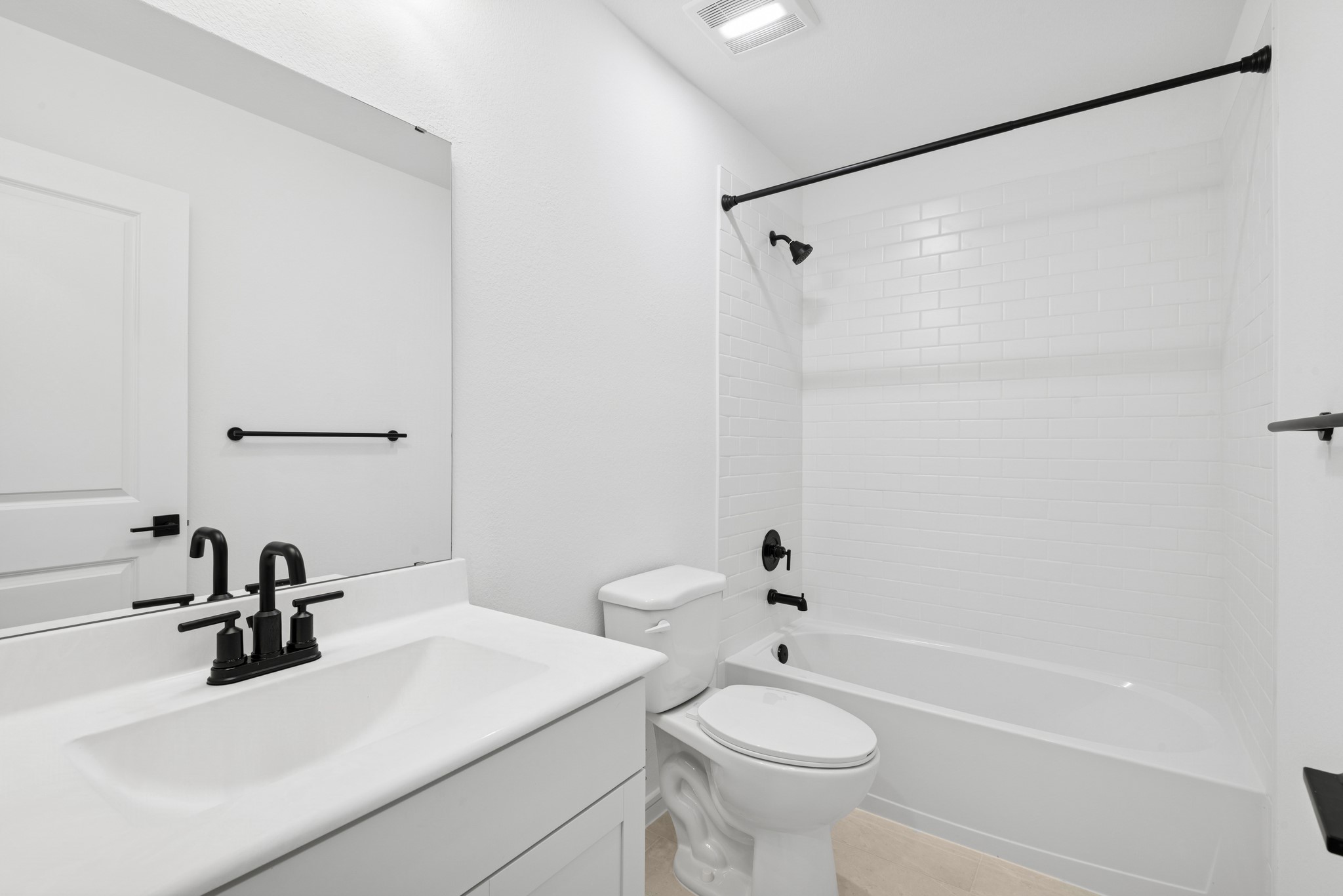 2606 Wastelbread Lane Rosenberg, TX 77471 - Photo 21 of 46 a bathroom with a sink mirror toilet and bathtub