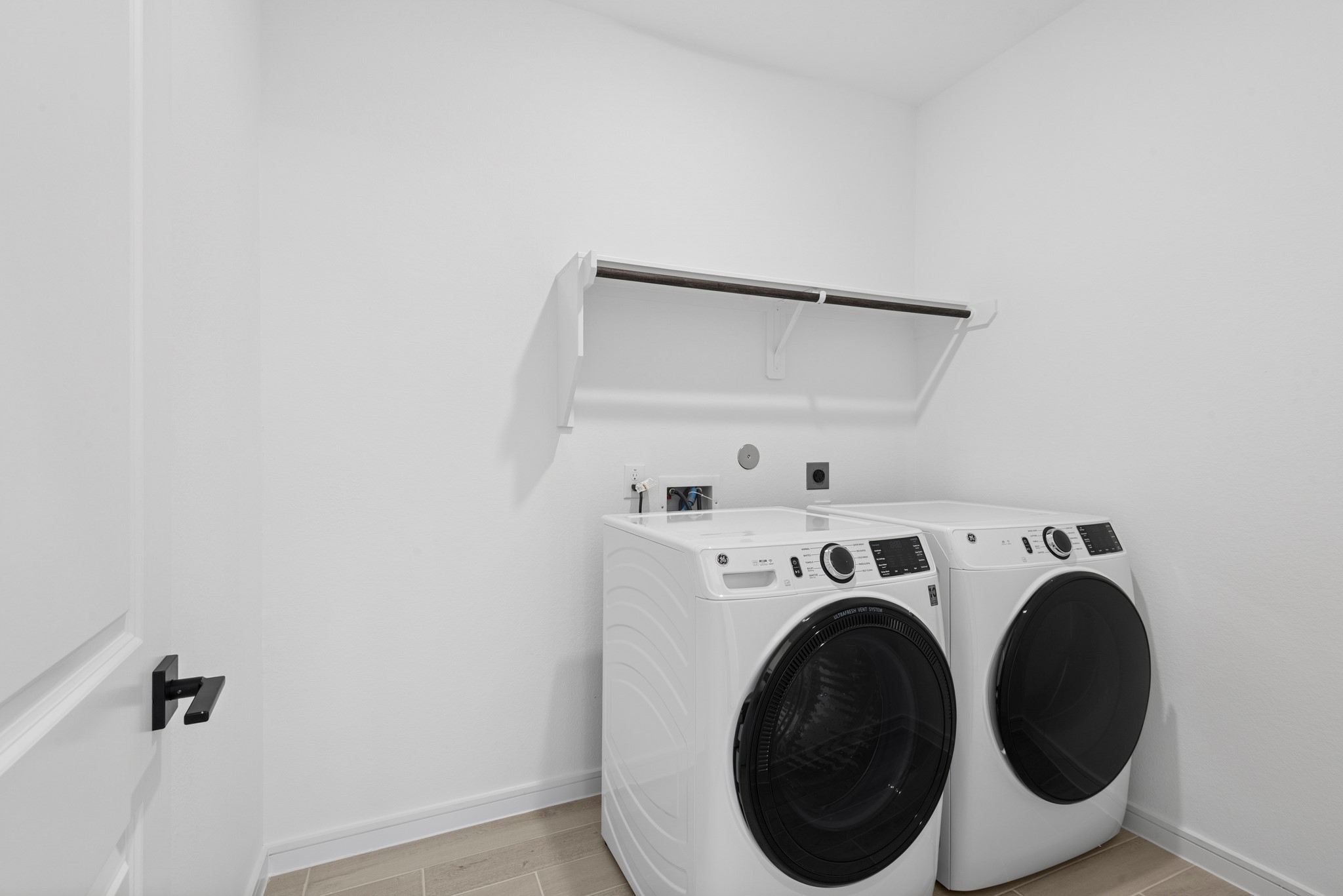 2606 Wastelbread Lane Rosenberg, TX 77471 - Photo 22 of 46 a utility room with dryer and washer