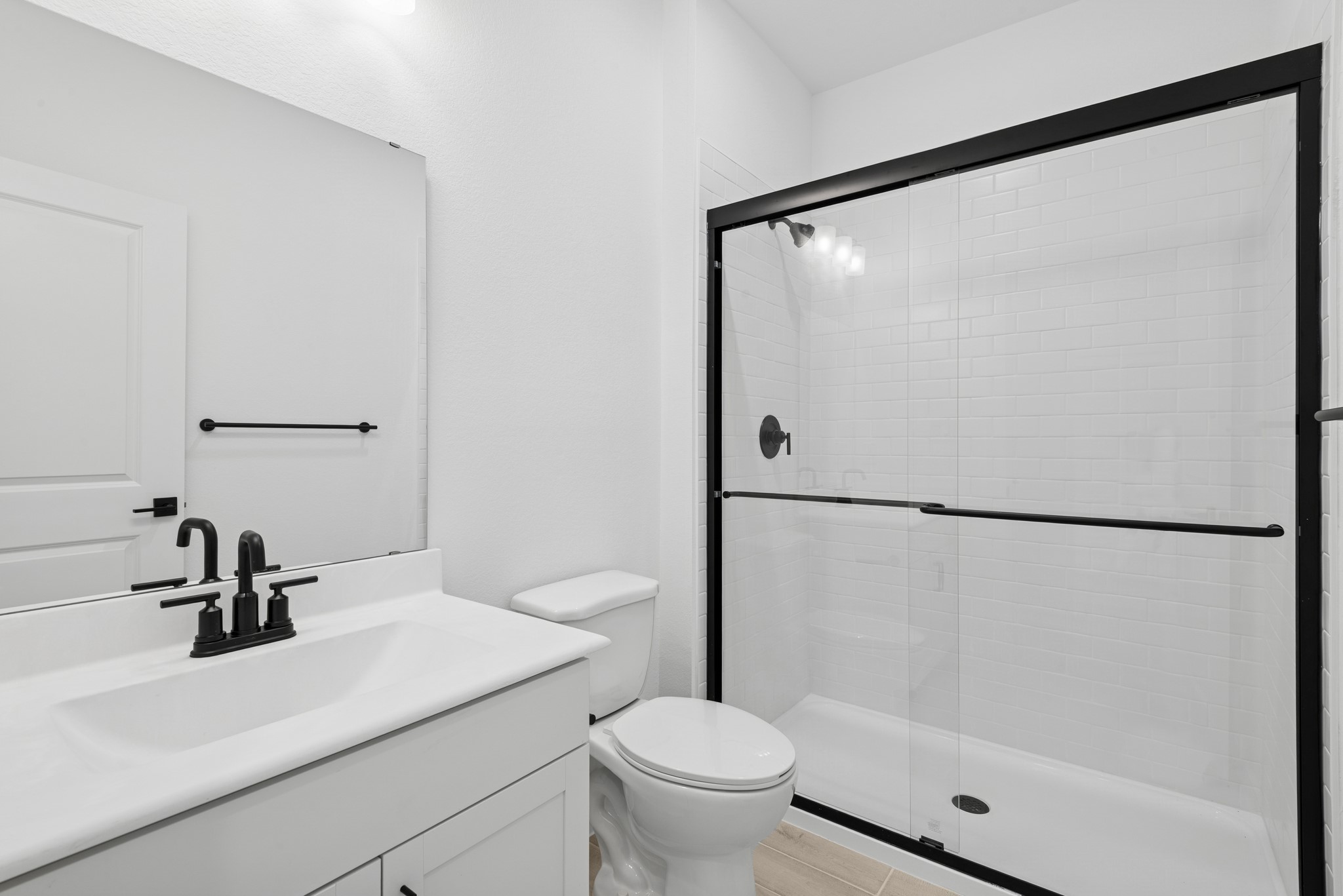 2606 Wastelbread Lane Rosenberg, TX 77471 - Photo 4 of 46 a bathroom with a sink toilet and shower