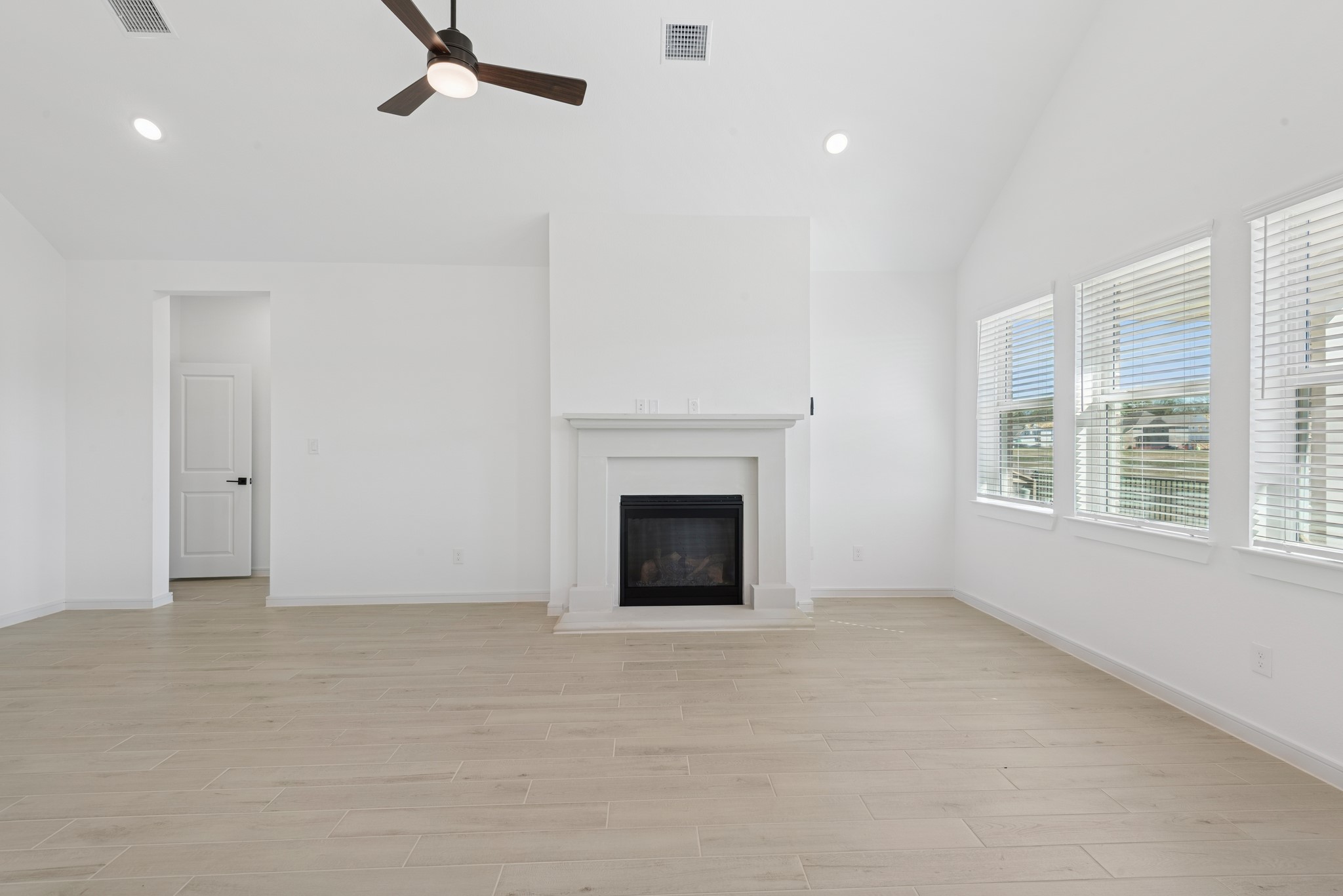 2606 Wastelbread Lane Rosenberg, TX 77471 - Photo 9 of 46 a view of a livingroom with a fireplace and window