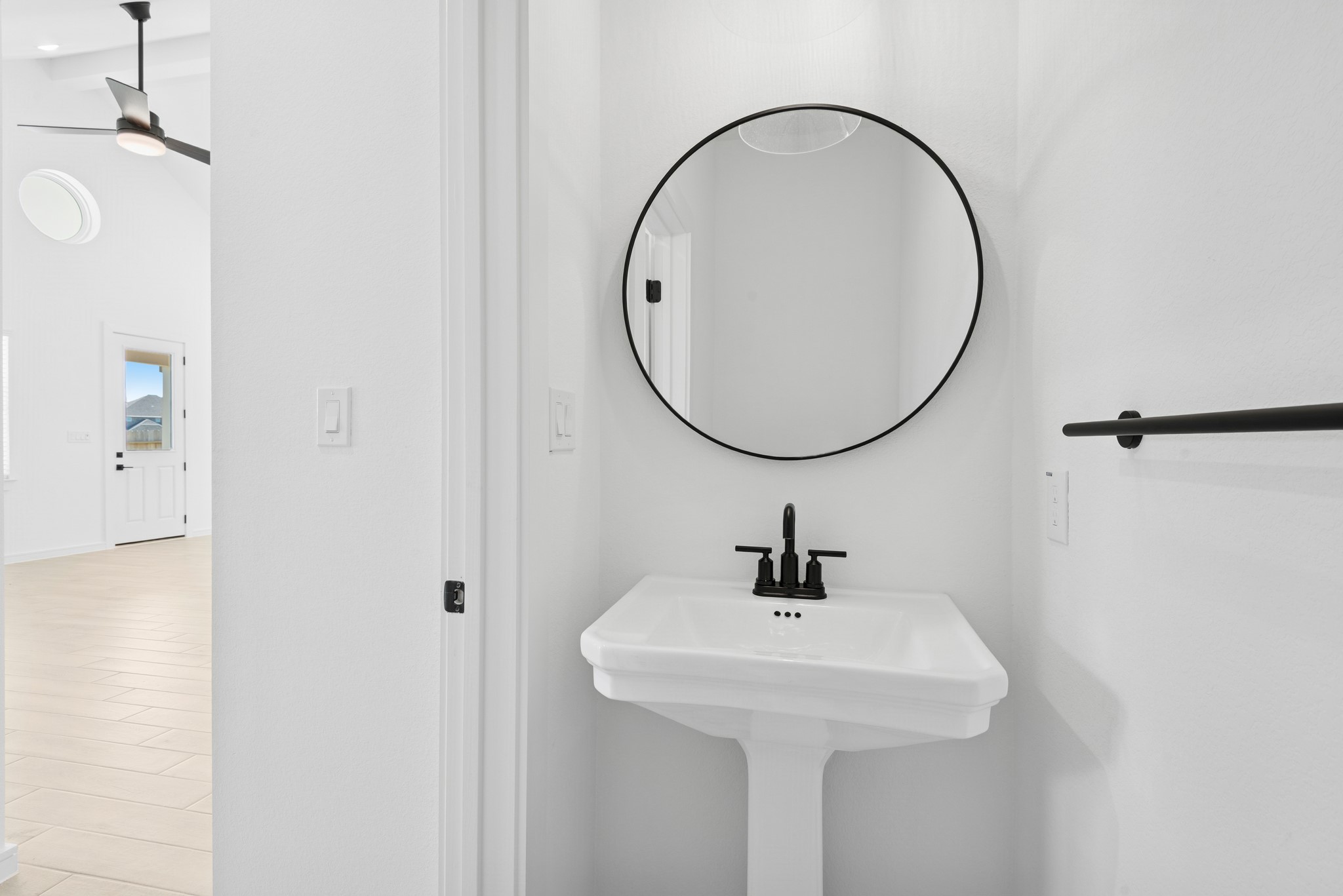 2606 Wastelbread Lane Rosenberg, TX 77471 - Photo 10 of 46 a bathroom with a sink and a mirror
