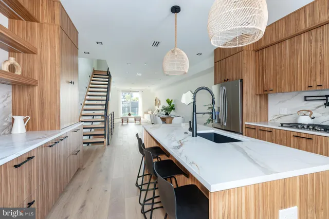 a bathroom with a sink and a window