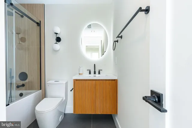 a kitchen with a sink and a window