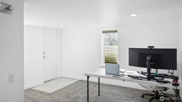a bathroom with a shower curtain and a sink