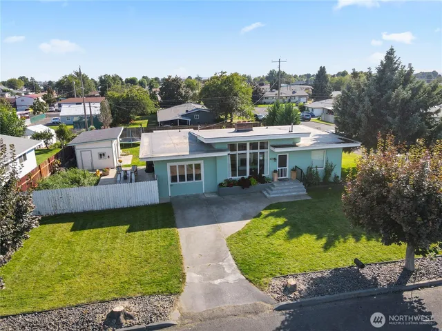 a view of a swimming pool with a patio