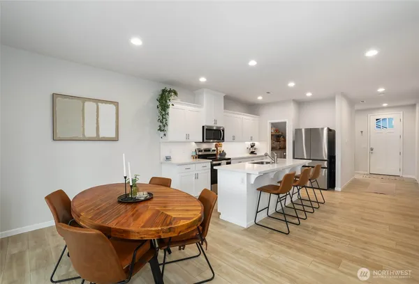 a view of a dining room with furniture