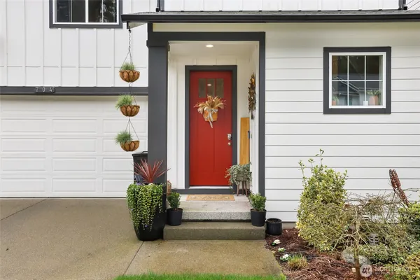 a front view of a house with a garage