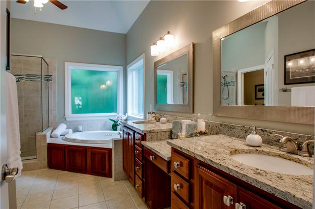4844 Redcastle Ridge Nashville, TN 37211 - Photo 10 of 20 Remodeled master bathroom with tub and shower, double vanities, and updated fixtures.