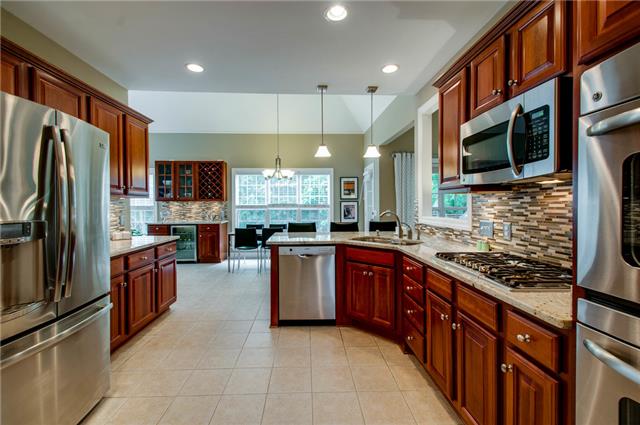 4844 Redcastle Ridge Nashville, TN 37211 - Photo 6 of 20 Recently remodeled kitchen with stainless steel appliances, double oven, under & over cabinet lighting, and granite counter tops.