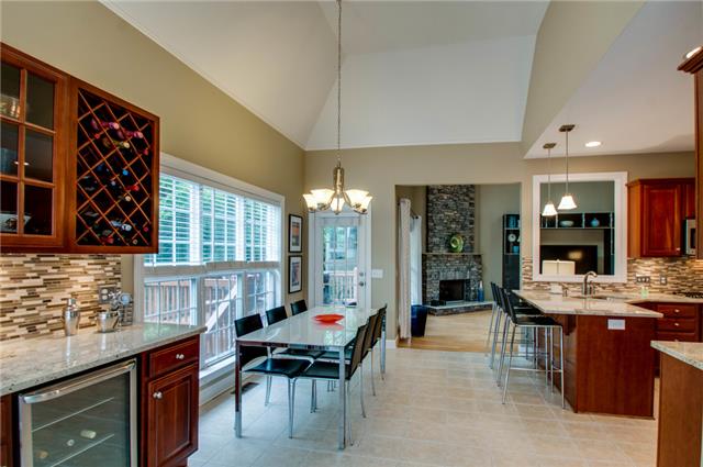 4844 Redcastle Ridge Nashville, TN 37211 - Photo 20 of 20 Open floorplan and thoughtfully placed pieces help the space flow with ease from living room, breakfast area, and sunroom.