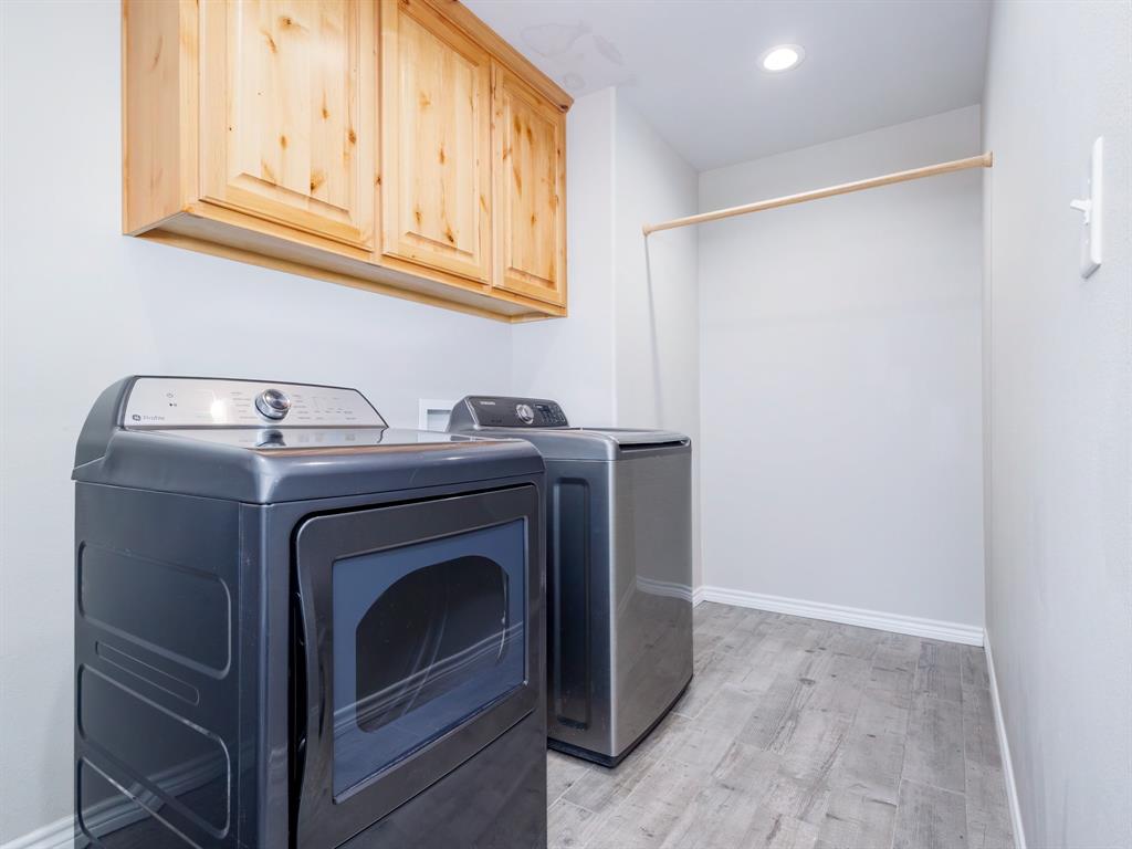 202 East Hall Court Early, TX 76802 - Photo 23 of 34 a utility room with dryer and washer