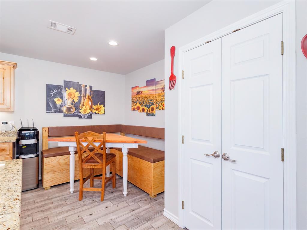 202 East Hall Court Early, TX 76802 - Photo 10 of 34 a view of a room with furniture and wooden floor