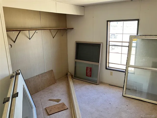 a living room with a couch and a flat screen tv