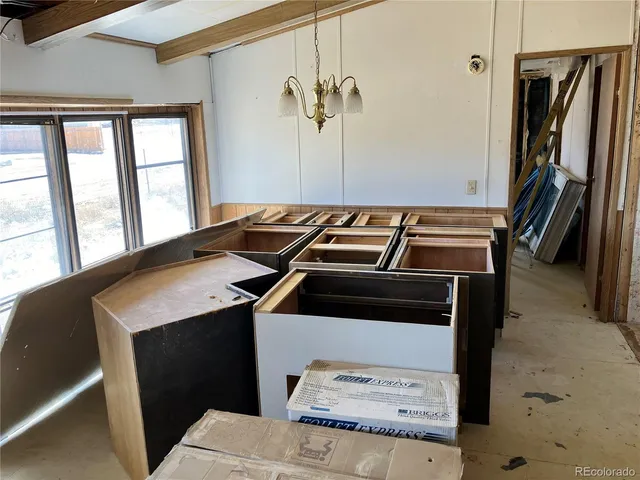 a bathroom with a bathtub and a window