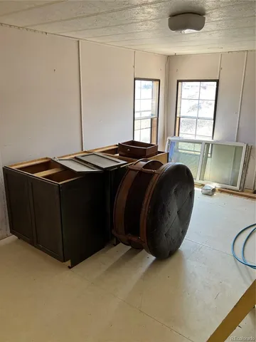 a view of a livingroom with furniture