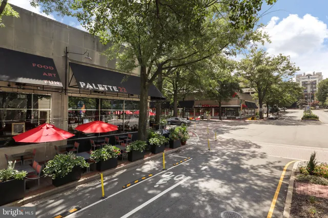 a view of a street with houses