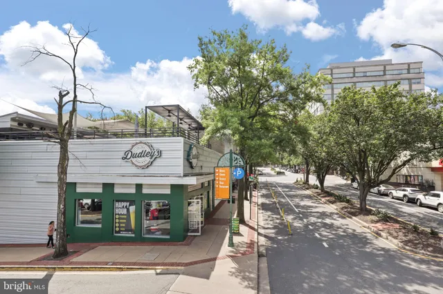 a view of a building with sitting area