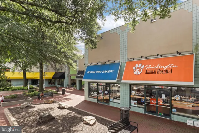 a sign that is sitting on a wooden floor