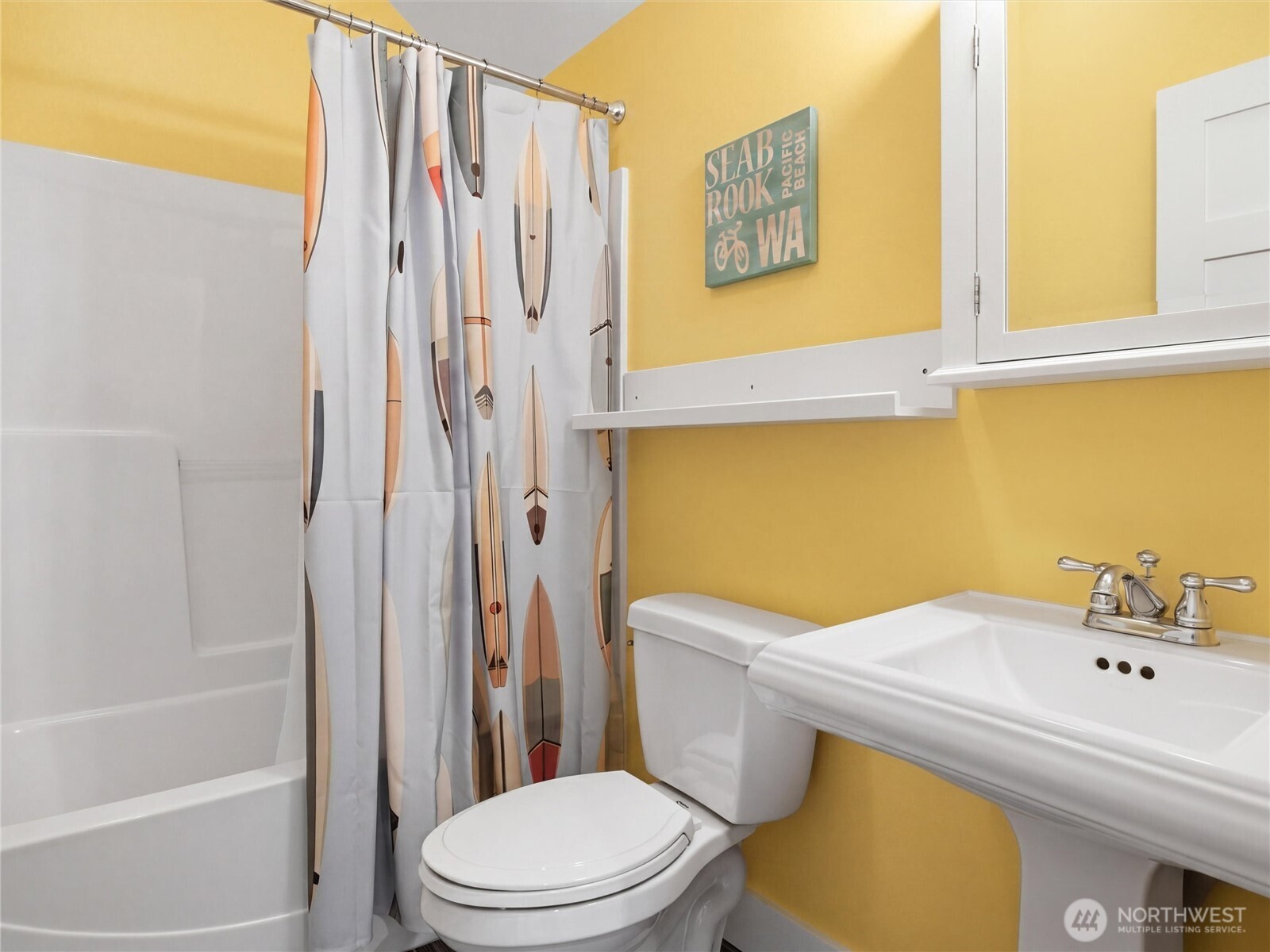 269 Compass Street Pacific Beach, WA 98571 - Photo 21 of 38 a bathroom with a sink a toilet and shower
