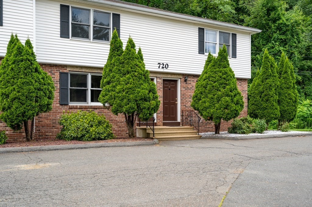 720 Russell Road, Unit C Westfield, MA 01085 - Photo 1 of 26 front view of a house with a yard