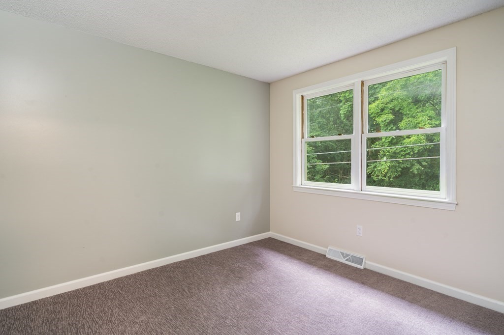 720 Russell Road, Unit C Westfield, MA 01085 - Photo 24 of 26 an empty room with a window