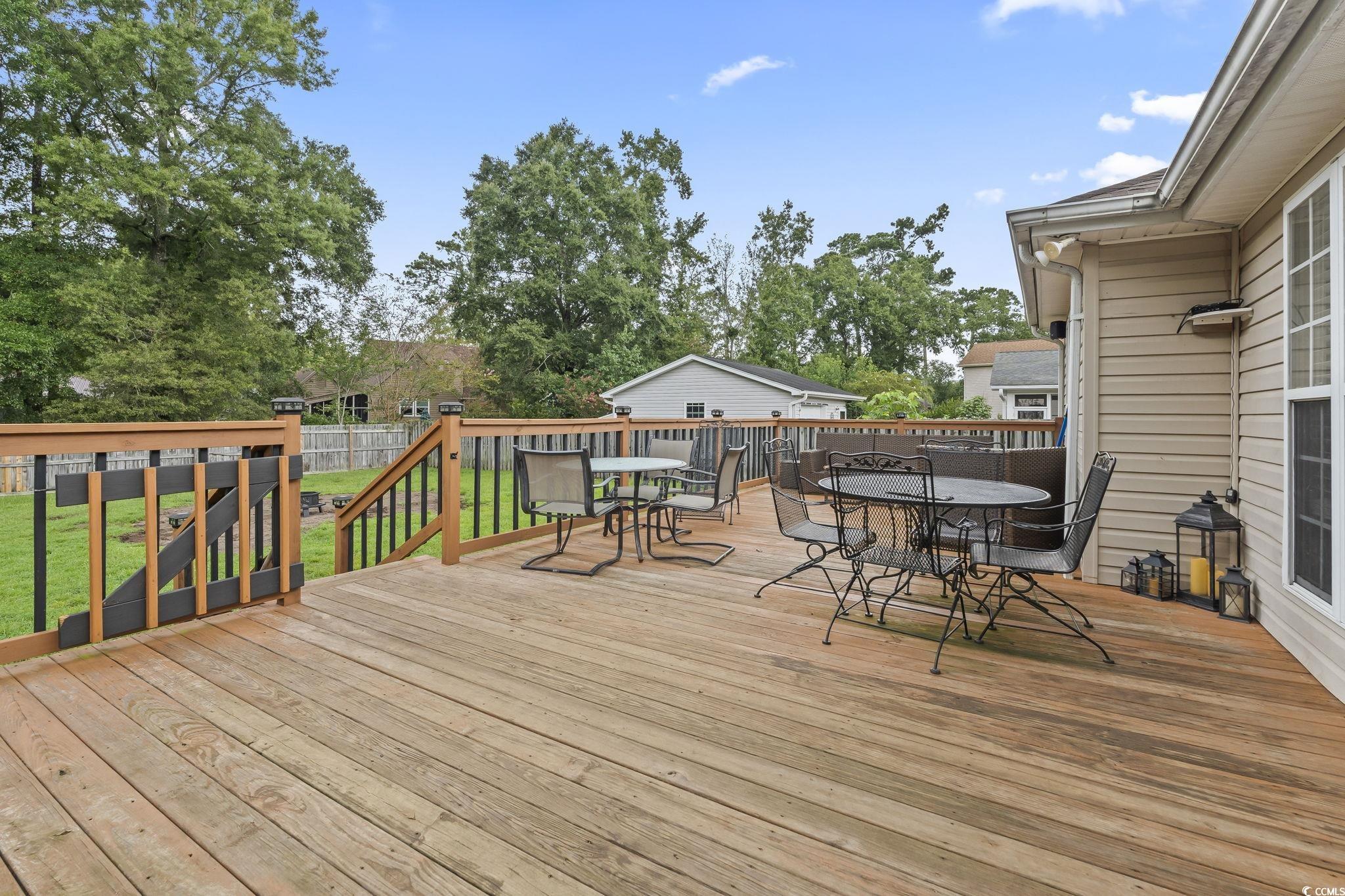 154 Hummingbird Court Myrtle Beach, SC 29579 - Photo 29 of 38 Deck featuring outdoor dining space and grilling area