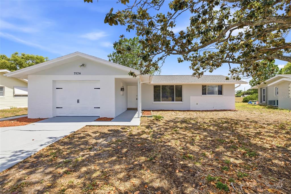 7526 Pineapple Lane Port Richey, FL 34668 - Photo 1 of 40