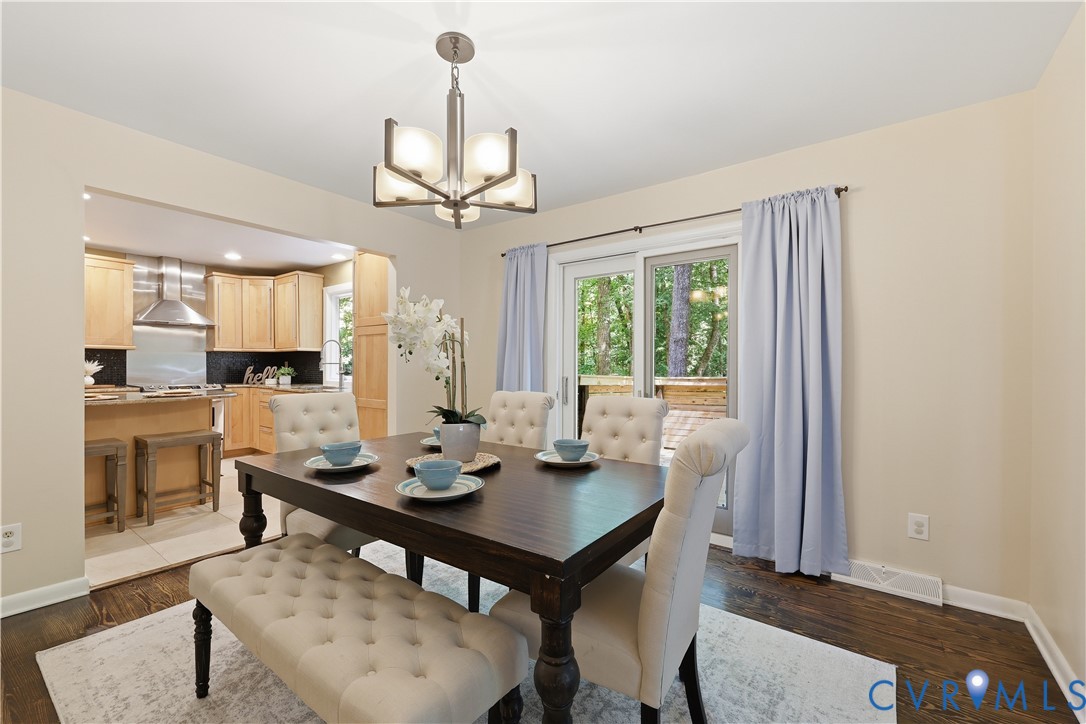 13622 Winterberry Ridge Midlothian, VA 23112 - Photo 13 of 47 a view of a dining room with furniture window and outside view