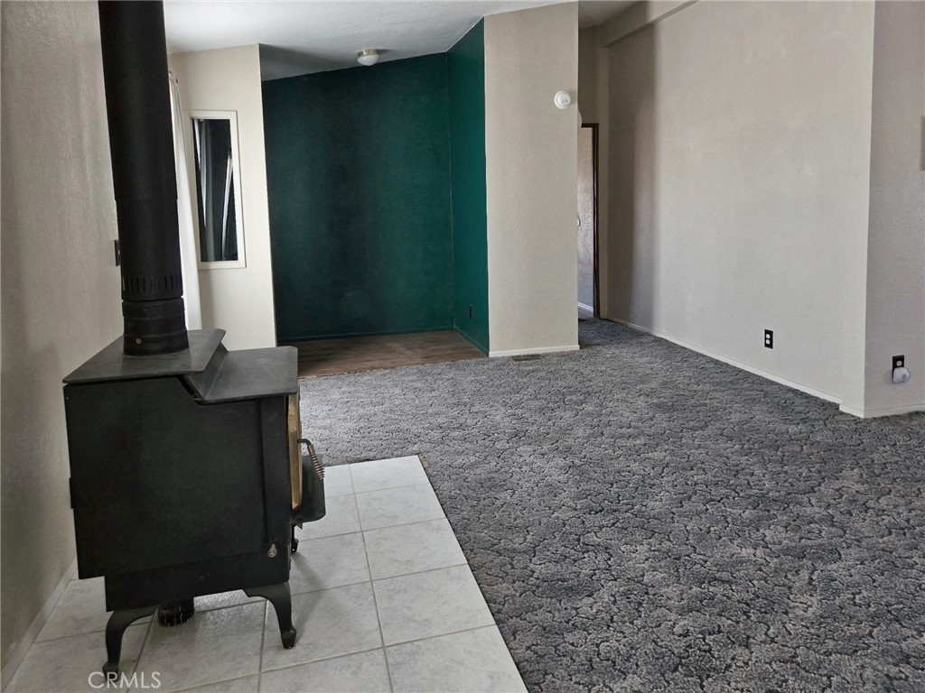 49645 3 Points Road Lancaster, CA 93536 - Photo 11 of 40 wooden floor with a rug