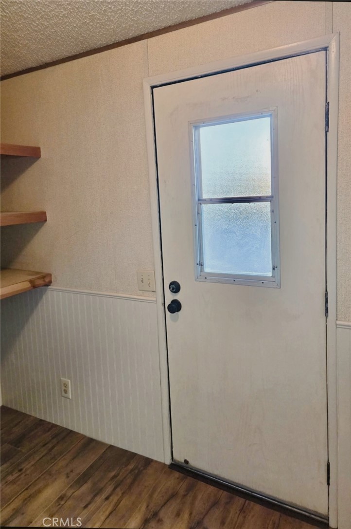 49645 3 Points Road Lancaster, CA 93536 - Photo 21 of 40 a view of a small space with wooden floor
