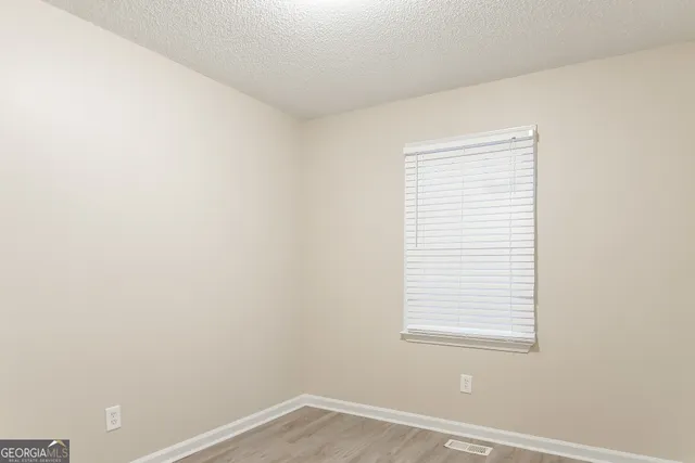 a view of a small space with a window