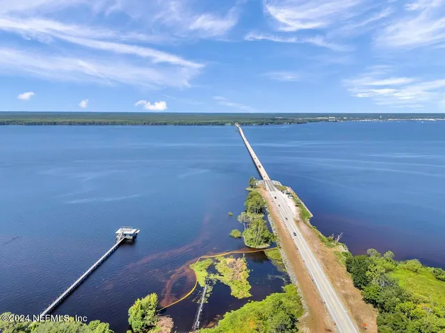 a view of balcony with furniture